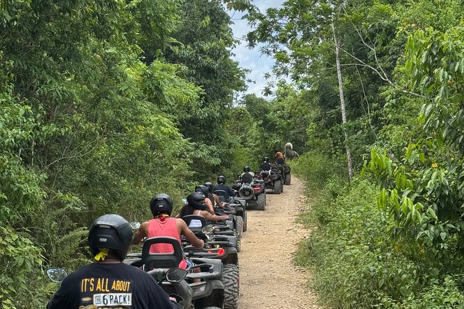 ATV Bamboo Rafting and Horseback Riding in Montego Bay - Bamboo rafting with a limestone foot massage