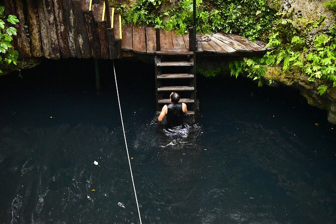 ATV Combo Horseback Riding, ATV, Ziplines, Cenote and Lunch - ATVs on a rough jungle course