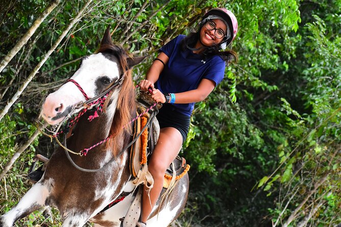 ATV (shared), Horse Back Riding, Ziplines, & Cenote from Cancún - ATV riding on jungle trails