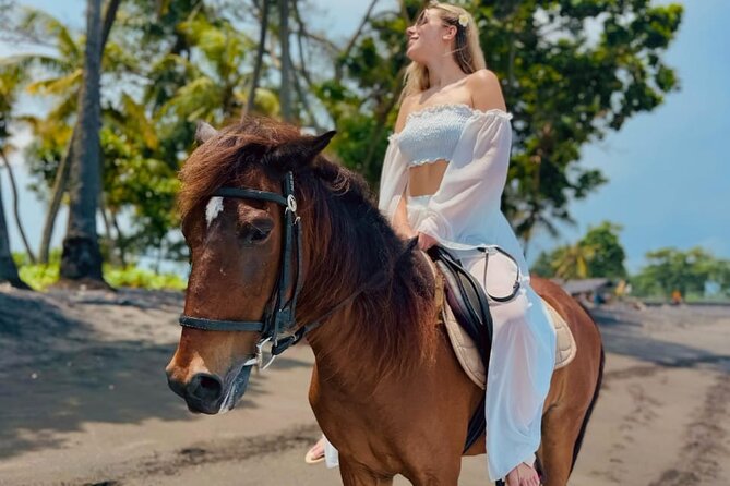 Bali Horse Riding Trot & Canter Saba Beach with Local Temple - The beach ride, fishing boats, and distant island views