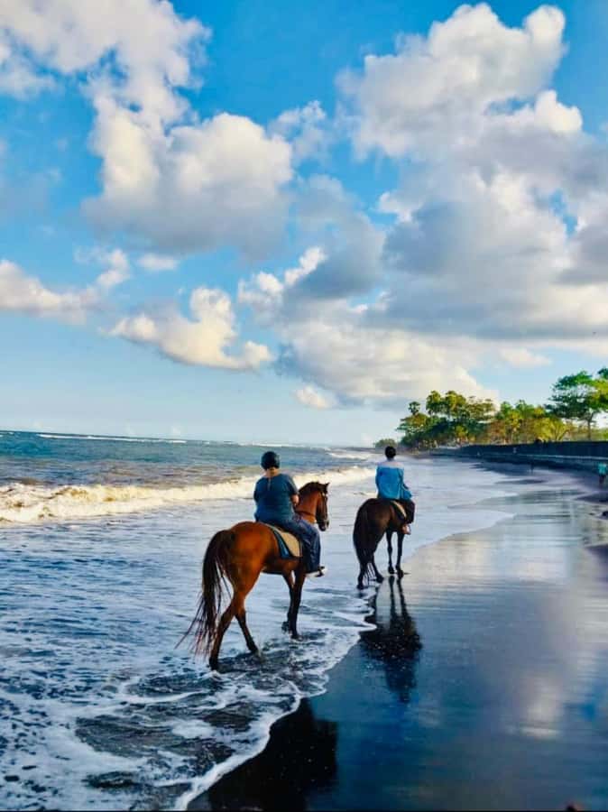 Bali: Horseback Tour Through Saba Beach and Local Temples. - Riding the black sand at Saba Beach