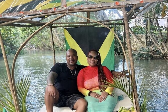 Bamboo Rafting and HorseBack Riding Excursion in OchoRios Jamaica - Riding the river on a handcrafted bamboo raft