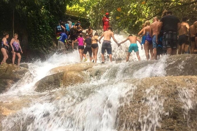 Bamboo Rafting, Dunn's River Falls and Horseback Riding Private Tour - Riding into the water near Ocho Rios