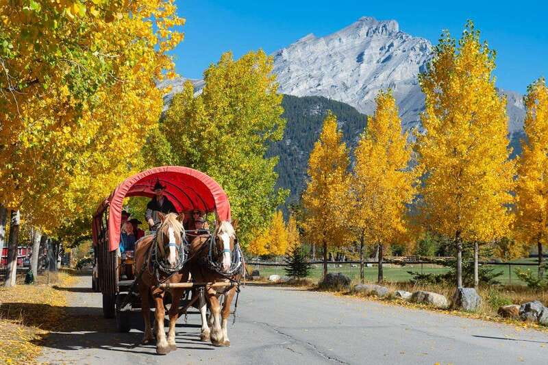 Banff: Wagon Ride with Cowboy Cookout BBQ - Starting at the big red stables in Banff