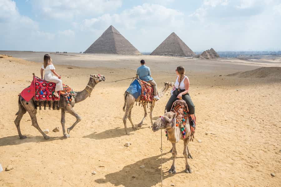 Cairo: Half Day Pyramids Tour by Camel or Horse Carriage - Meeting the Great Pyramid at Giza