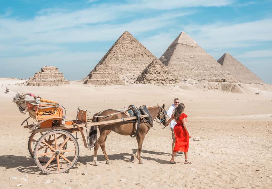 Cairo: Half Day Pyramids Tour by Camel or Horse Carriage - Hotel pickup and the Cairo drive