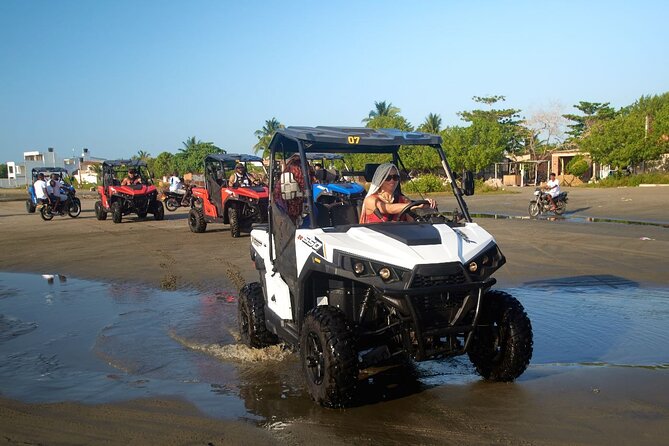 Cartagena ATV Buggy and Horseback riding Beach and Barrio Tour - Through the fishing village and barrio