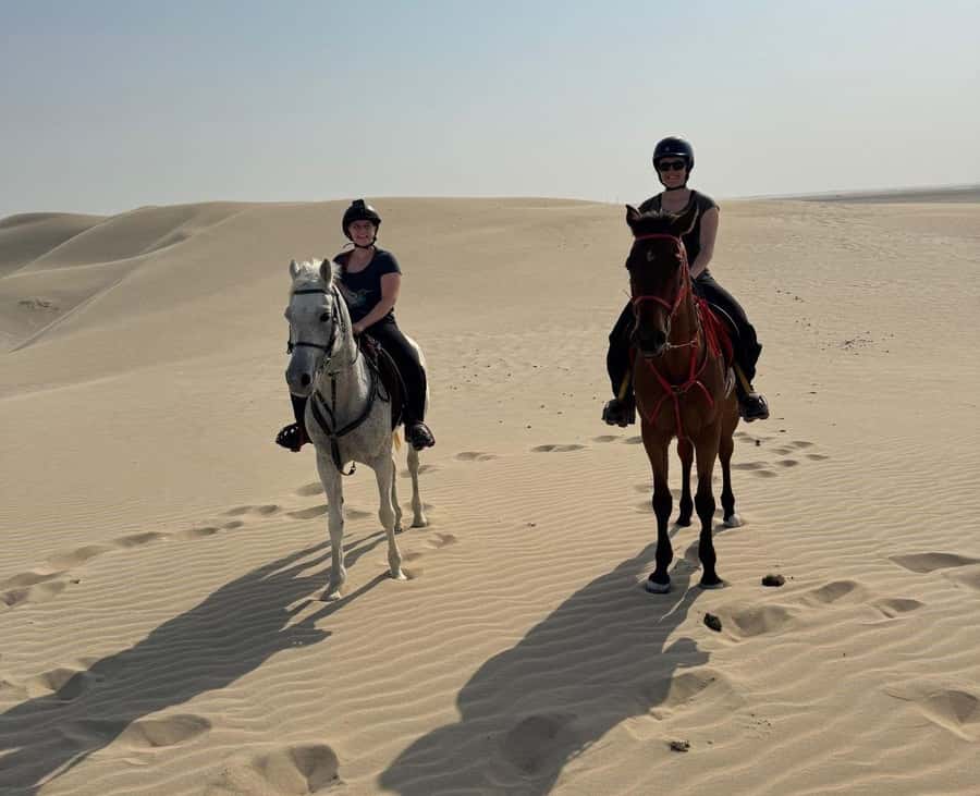 Doha Horseback Riding Adventure in Desert with Transfers - Riding Arabian horses beyond Doha