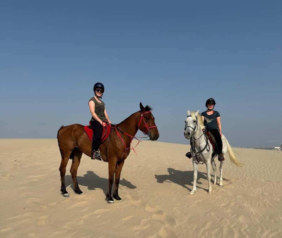 Doha Horseback Riding Adventure in Desert with Transfers - Arrival, briefing, and choosing your horse