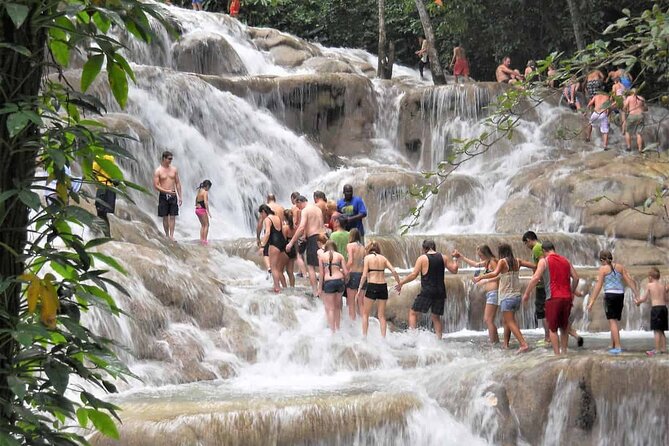 Dunn's River Falls and Horse Back Riding Excursion - Climbing Dunn’s River Falls, one wet step at a time
