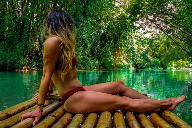 Dunn's River Falls, Blue Hole, Bamboo Rafting, Horseback Combo - White River bamboo rafting slows the pace