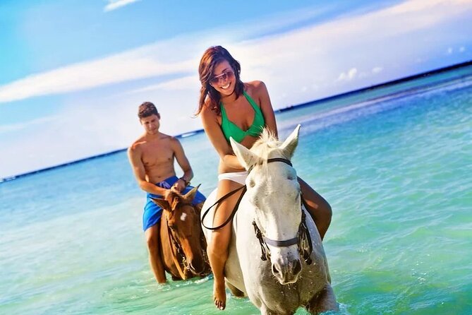 Dunn's River Falls, Blue Hole, Bamboo Rafting, Horseback Combo - Lunch brings jerk, oxtail, and rice and peas