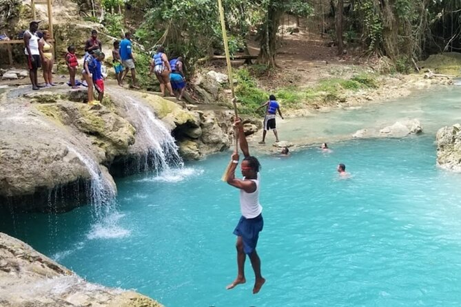 Dunn's River Falls, Blue Hole, Bamboo Rafting, Horseback Combo - Blue Hole action: rope swings, lagoons, and cliff jumps