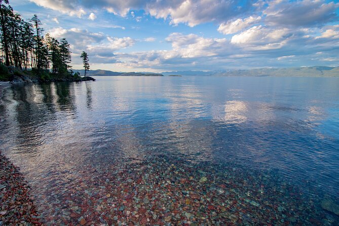 Flathead Lake Private Sunset Wild Horse Island Boat Tour - Cruising Rocky Point with the mountains ahead