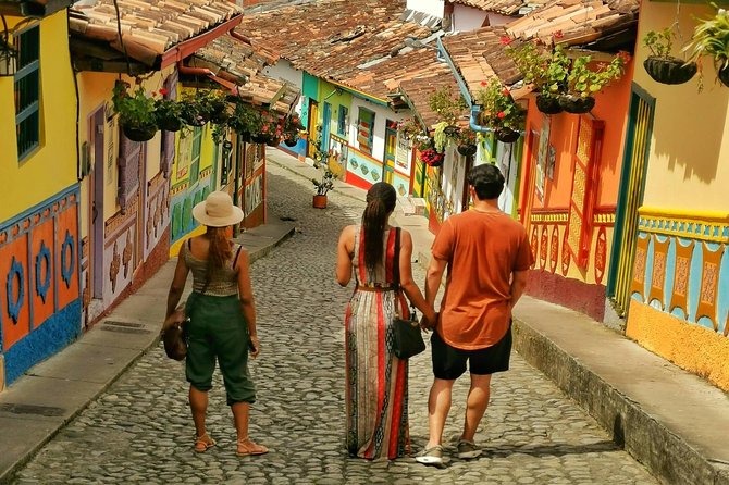 Guatape & Horse Ride & El Peñol Rock & Quaint Town From Medellin - Exploring the painted streets of Guatapé