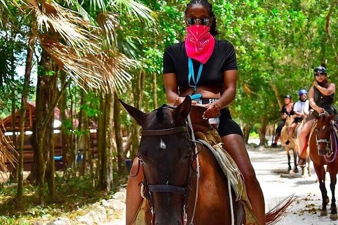 Half Day Horseback Riding Adventure with Cenotes in the Jungle - Entering the cave cenote
