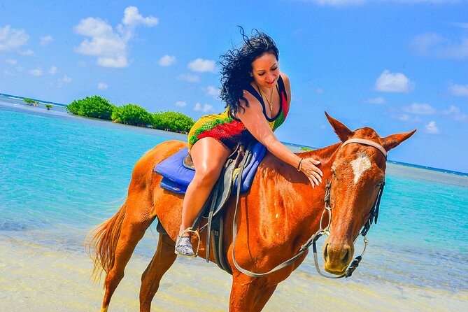 Horseback Ride and Swim Experience Montego with Transportation - Entering the water with your horse