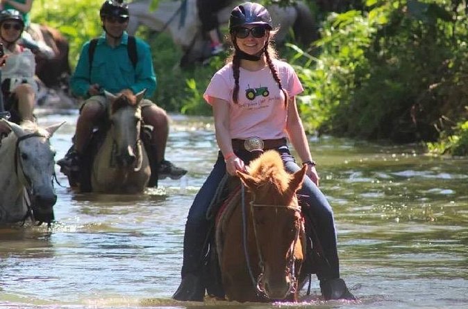 Horseback Riding along the Beach - Taking a dip in the water