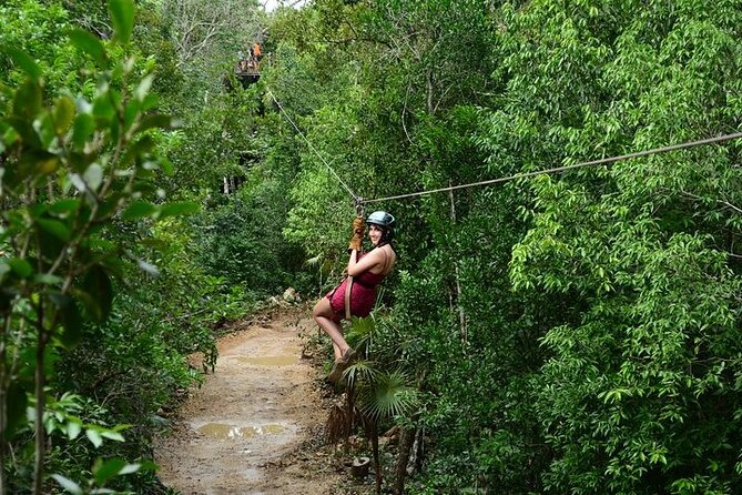 Horseback Riding and Zipline Jungle Adventure - Swimming in a clear underground cenote