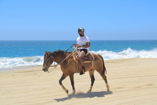 Horseback Riding Beach and Desert Adventure - Riding through mountains and desert trails