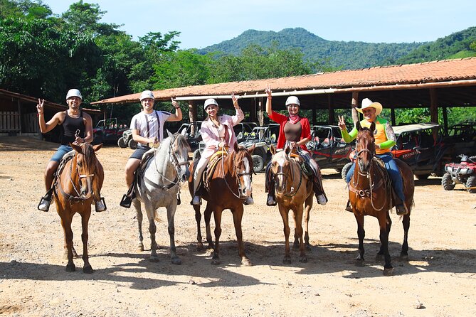 Horseback Riding Experience in Puerto Vallarta - Walking across the huge suspension bridge