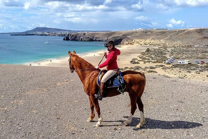 Horseback Riding in the sunset of Famara Beach, Lanzarote, Spain - Why Famara Beach works so well at sunset