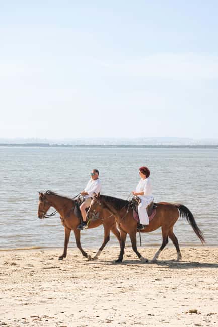 Horseback Riding Through The Beach GROUP - PDT - A quiet beach ride beside the Tagus