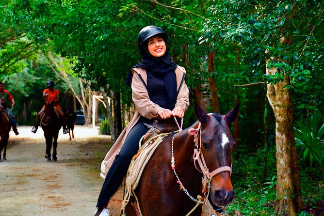 Horseback Riding with ATV, Zipline, Cenote and Tequila Tasting - ATV riding through wooded terrain