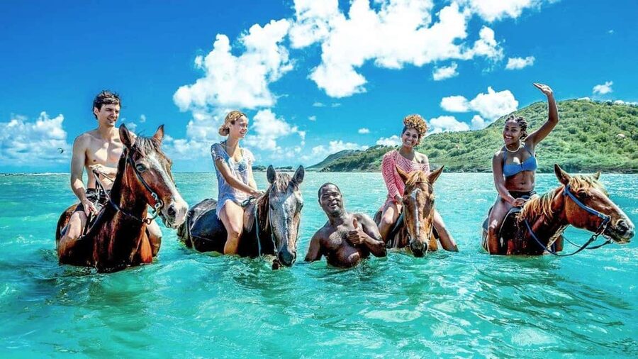 Montego Bay: Dunn's River Falls & Horseback Riding Adventure - Climbing Dunn’s River Falls one wet step at a time