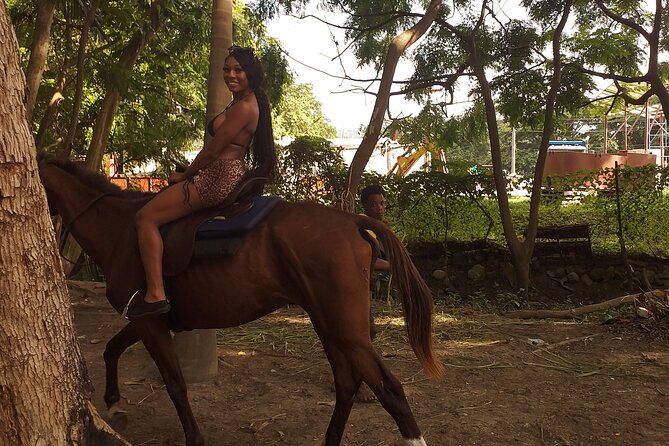 Private & Customize Tour to Martha Brae Rafting and Horseback Riding N Swim - A gentle start on the Martha Brae River
