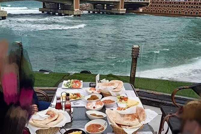 Private Night Tour In Alexandria By Horse Carriage Ride And Free Walking Tour - Walking the Corniche toward Stanley Bridge