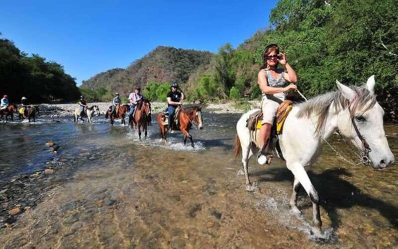 Puerto Escondido: Sunset Horse Back Riding Tour - Two Hours on Horseback Through Jungle and Ranch Country