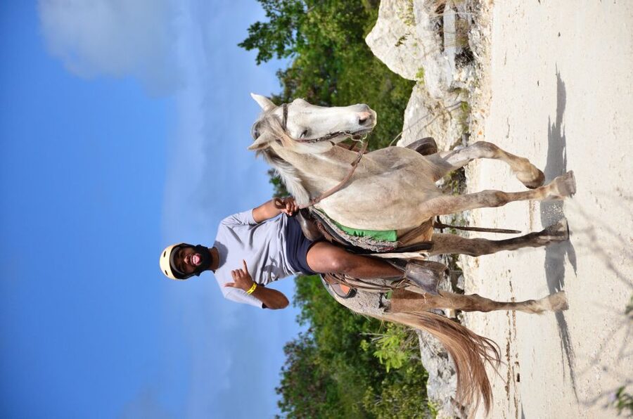 Punta Cana: Bávaro Adventure Park Horse Riding & Waterfalls - Cooling off at the Waterfall Pool