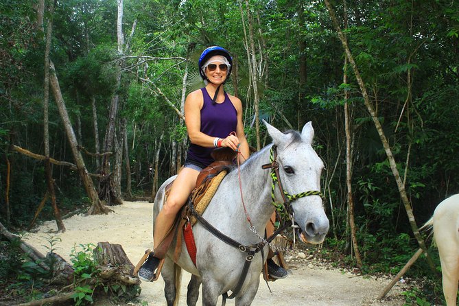 Single ATV, Horseback Riding, Ziplines and Cenote Swim - Swimming in an authentic Mayan cenote