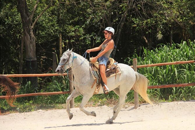 Tulum Jungle Horseback Ride + ATV + Ziplines + Cenote Combo Tour - Lunch, water, and hammock time