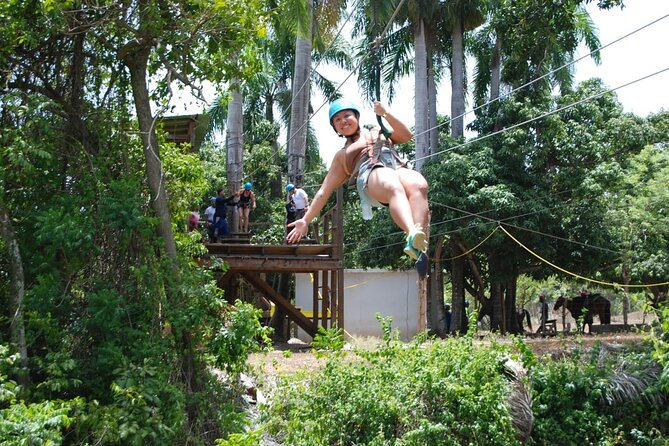 VIP DayPass: ATV, ZipLine, Horse Riding / Shore Excursion & Hotel - ATV riding through a riverbed and village roads