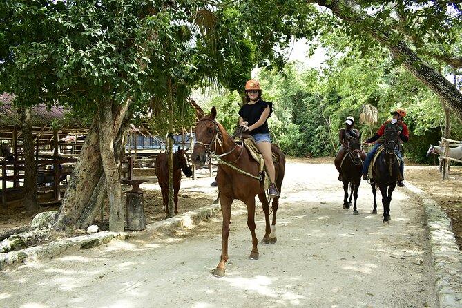 Wonderful Jungle Experience with Horse Riding, ATV, Ziplines and Cenote - Cooling off in a Mayan cenote