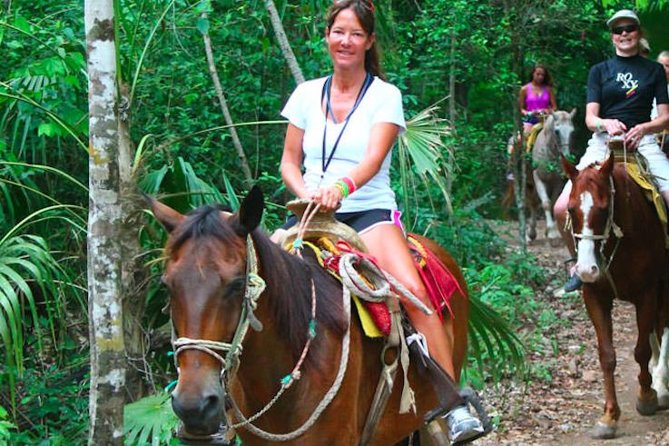 Ziplining and Horseback Riding Experience from Cancun and Playa del Carmen - Zipping above the rainforest canopy