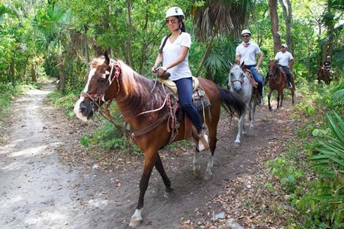 Ziplining and Horseback Riding Experience from Cancun and Playa del Carmen - Cooling off in a Yucatan cenote